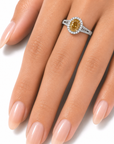 1.32 ct. Yellow Oval Natural Diamond Halo Ring