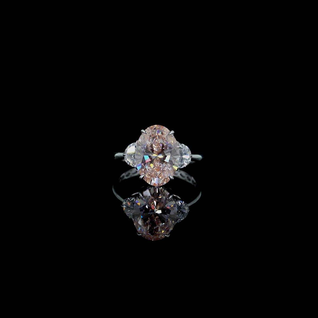 5.01 ct. Pink Oval Lab Diamond Three-Stone Ring