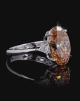 5.54 ct. Brown Oval Lab Diamond Three-Stone Ring